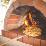 Qual è il costo per un forno a legna per pizzeria?